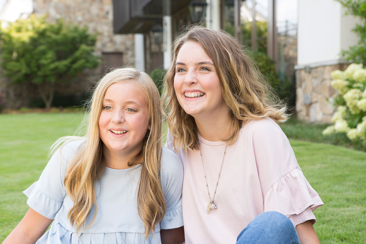 sisters smiling