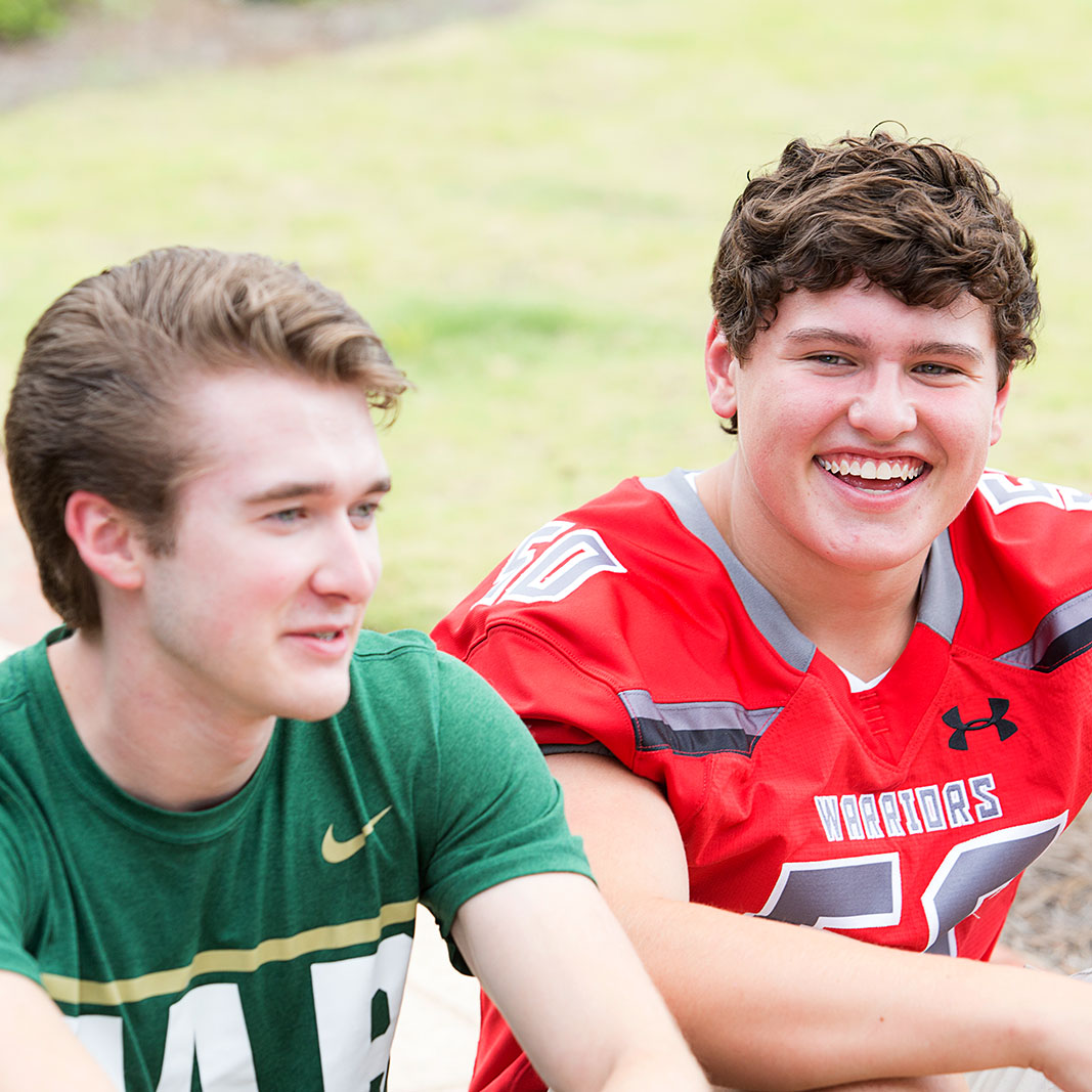 boys in football jerseys