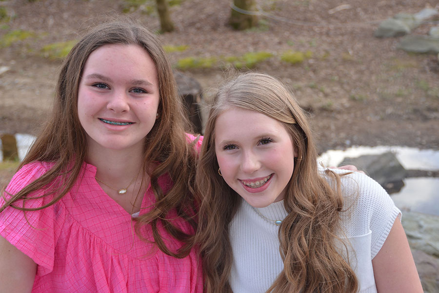 young girls smiling together