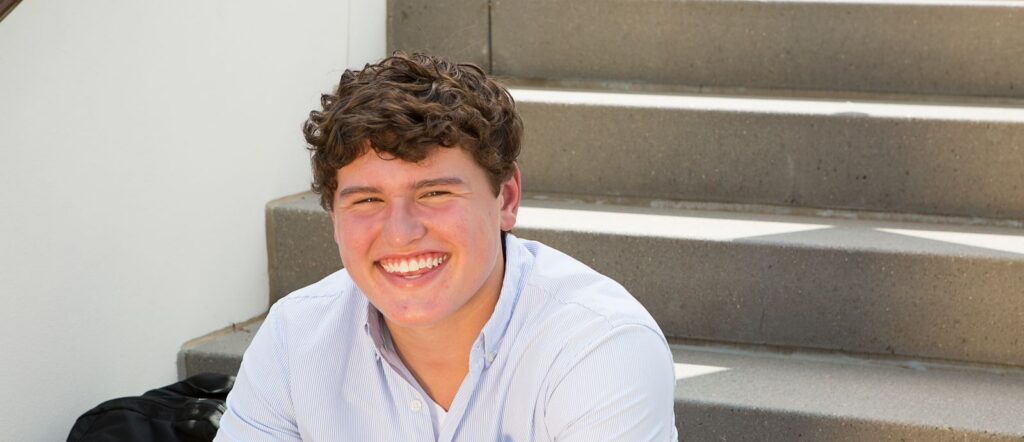 Teen patient smiling at Canales Orthodontics