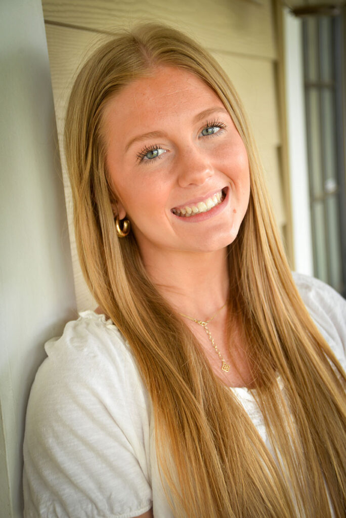 girl wearing clear aligners